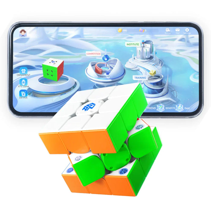 GAN smart speed cube in front of mobile app interface, showcasing advanced speedcubing technology.