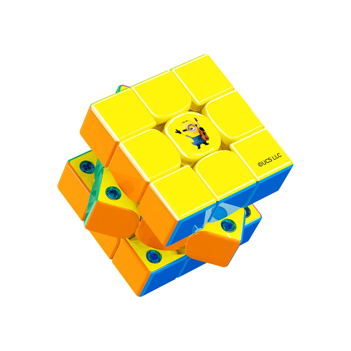 Minion-themed 3x3 speed cube with yellow, blue, and orange colors, featuring a cartoon character on center tile