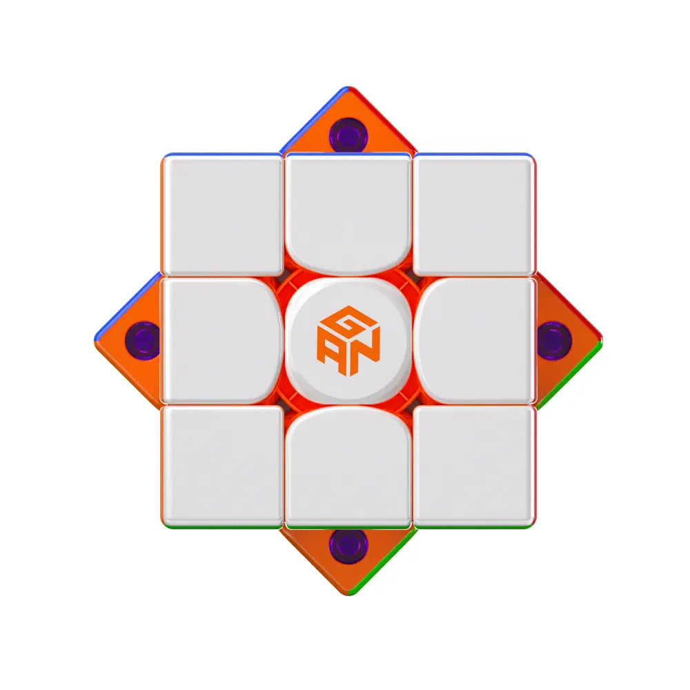 GAN speed cube with white face and orange logo, featuring colorful transparent edges and purple magnets